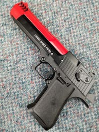 Cybergun BY-104443 Desert Eagle .50AE CO2 GBB Pistol; FULL AUTO; Black; PTT Red