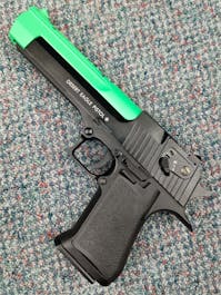 Cybergun BY-104444 Desert Eagle .50AE CO2 GBB Pistol; FULL AUTO; Black; PTT Green