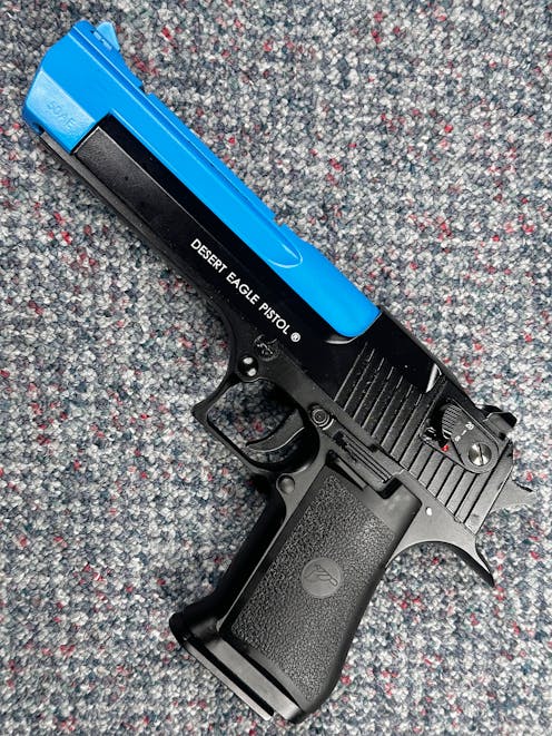Cybergun BY-104460 Desert Eagle .50AE CO2 GBB Pistol; FULL AUTO; Black; PTT Blue