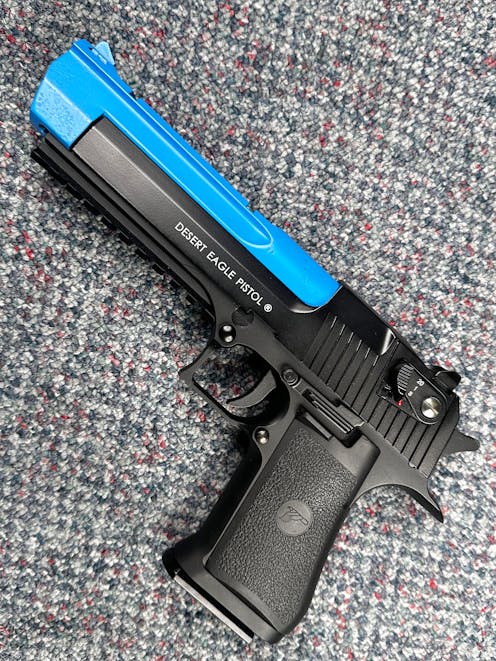 Cybergun BY-104211 Desert Eagle .50AE Railed CO2 GBB Pistol; FULL AUTO; PTT Blue