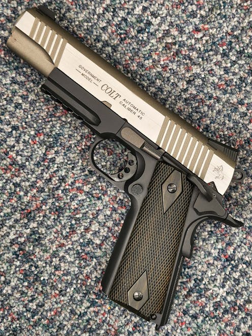 Cybergun BY-104851 Rail Gun Series Colt 1911 CO2 Blowback Pistol; Silver / Black