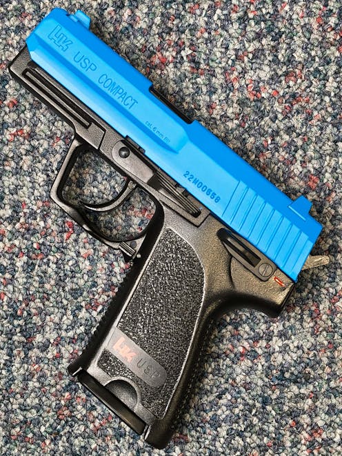 Umarex BY-103523 H&K USP Compact Spring Operated Airsoft Pistol; PTT Blue