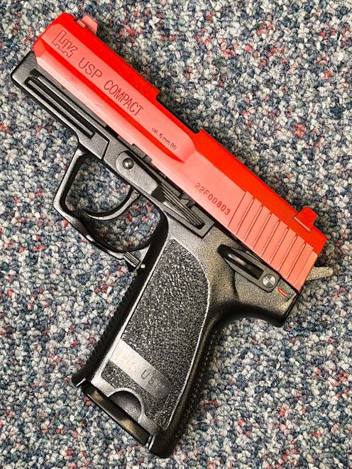 Umarex BY-103084 H&K USP Compact Spring Operated Airsoft Pistol; PTT Red