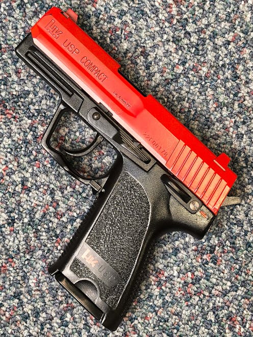 Umarex BY-103128 H&K USP Compact Spring Operated Airsoft Pistol; PTT Red