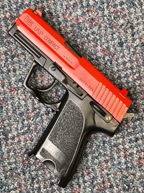 Umarex BY-103079 H&K USP Compact Spring Operated Airsoft Pistol; PTT Red
