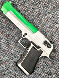 Cybergun BY-105359 Desert Eagle .50AE CO2 GBB Pistol; FULL AUTO; Silver; PTT Green