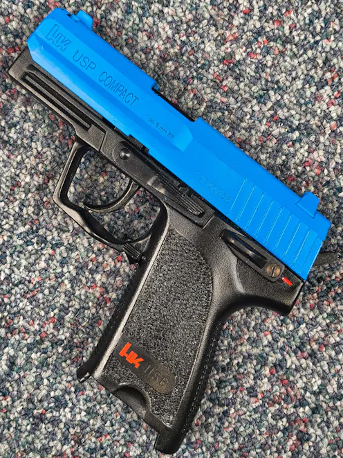 Umarex BY-105584 - H&K USP Compact Spring Operated Airsoft Pistol; PTT Blue